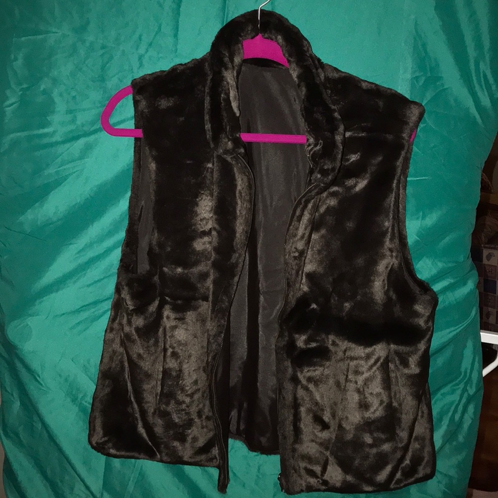 Blassport faux fur reversible vest.